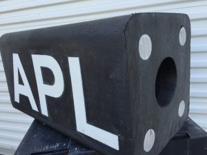 Plastic Lumber in black with APL text